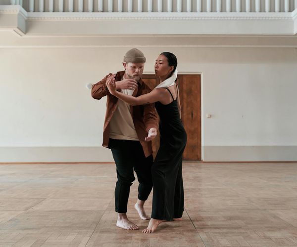 Man performing a powerful core-strengthening exercise in a modern studio.