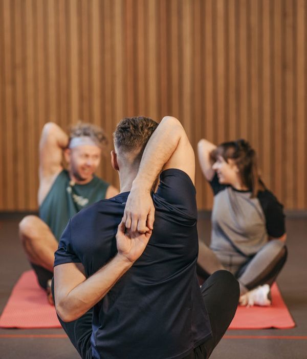 Man stretching his body, showing improved flexibility.